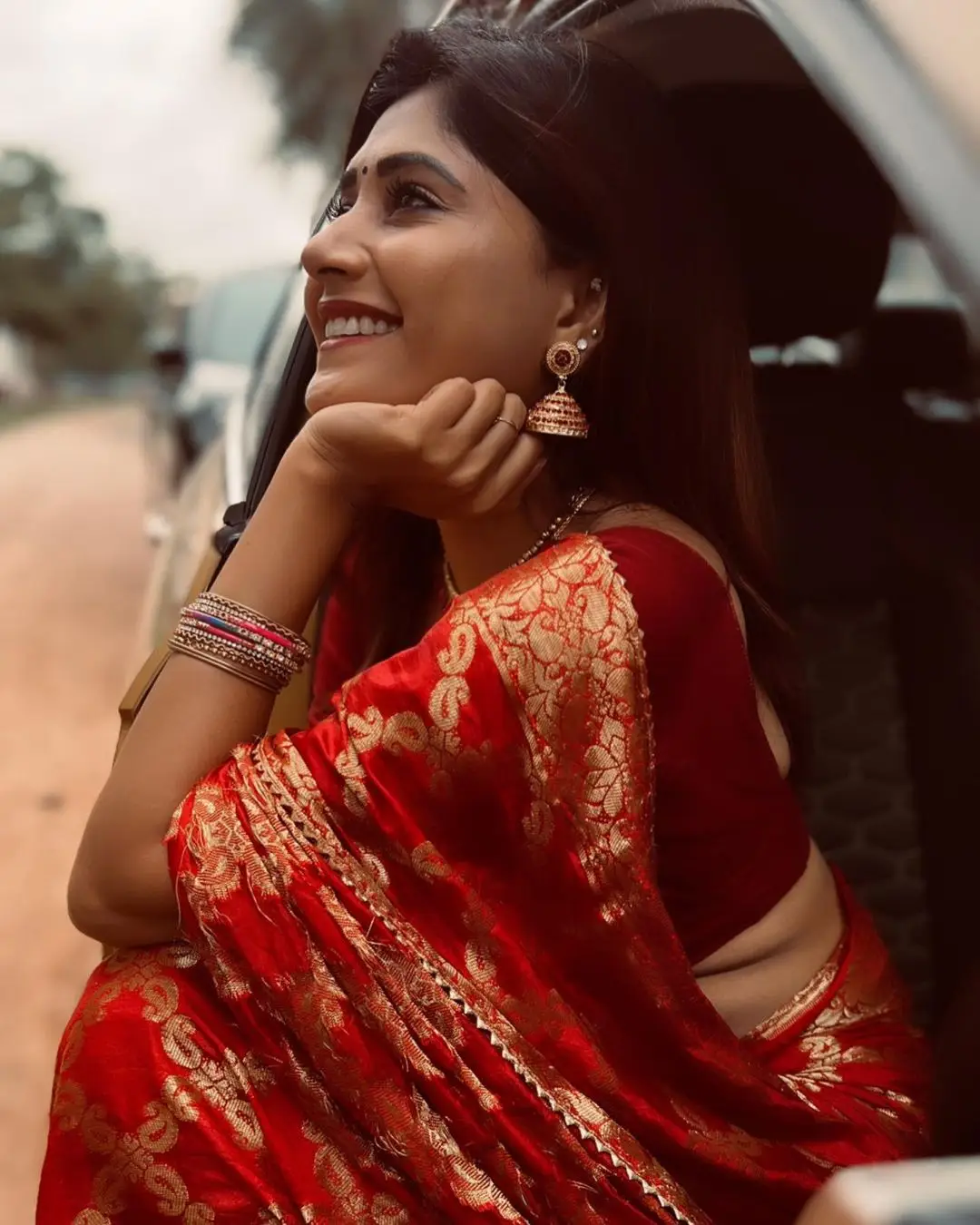 Vasanthi Krishnan Wearing Traditional Red Saree Blouse